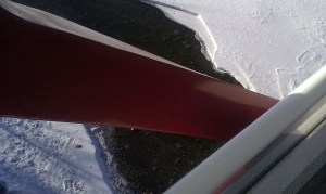 Bow river is breaking free of ice on a spring day